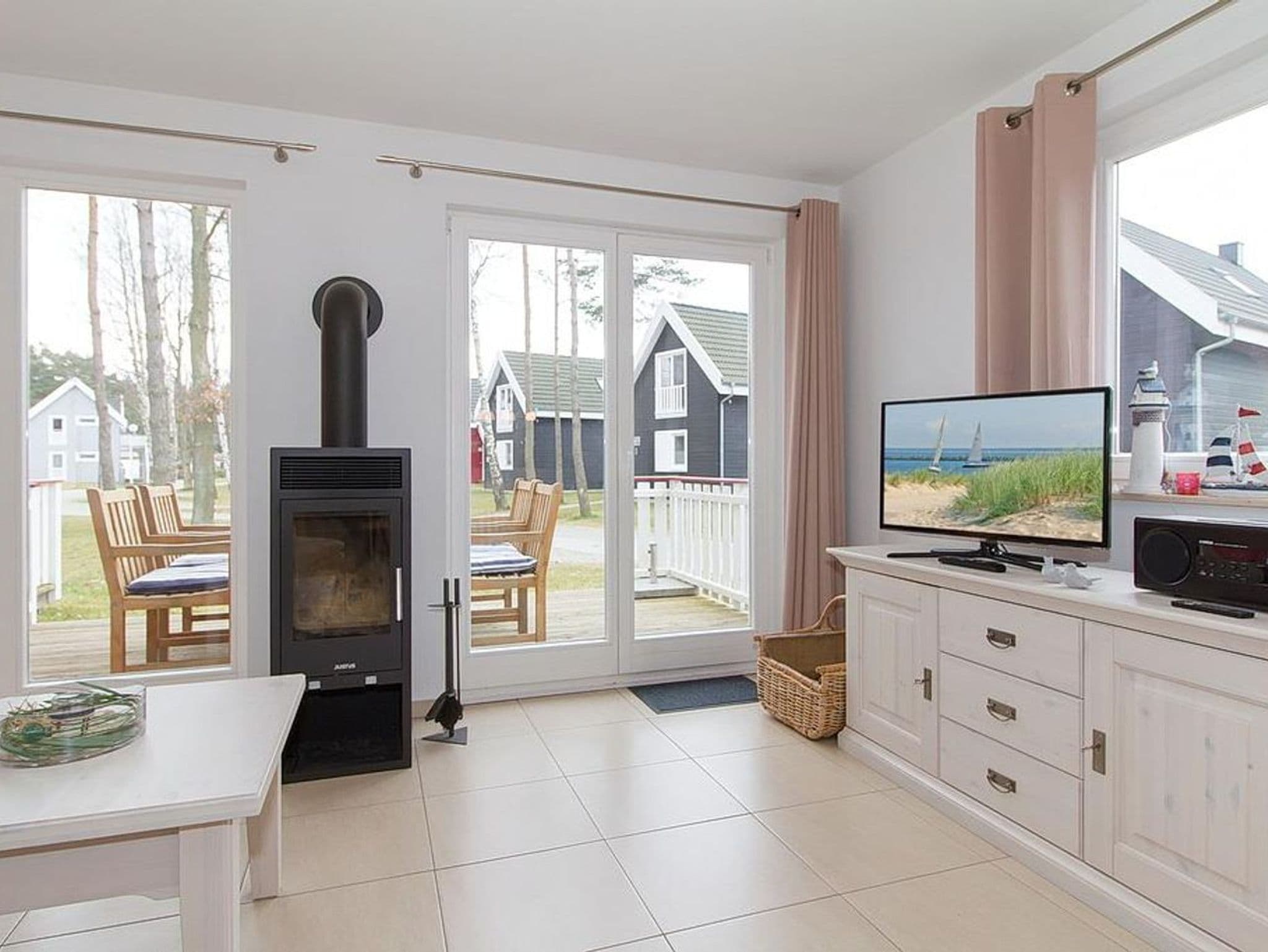 Tolles Ferienhaus mit Infrarotsauna, Kamin und Südterrasse - 700 m zum Strand! - Ostseepark Rügen detail 1