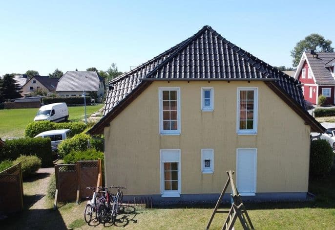 Fewo Seelenfrieden 1 - Garten ist dabei, Hund - Sonnige Ferienwohnung mit Südterrasse und zwei Schlafzimmern in Alt Reddevitz detail 1