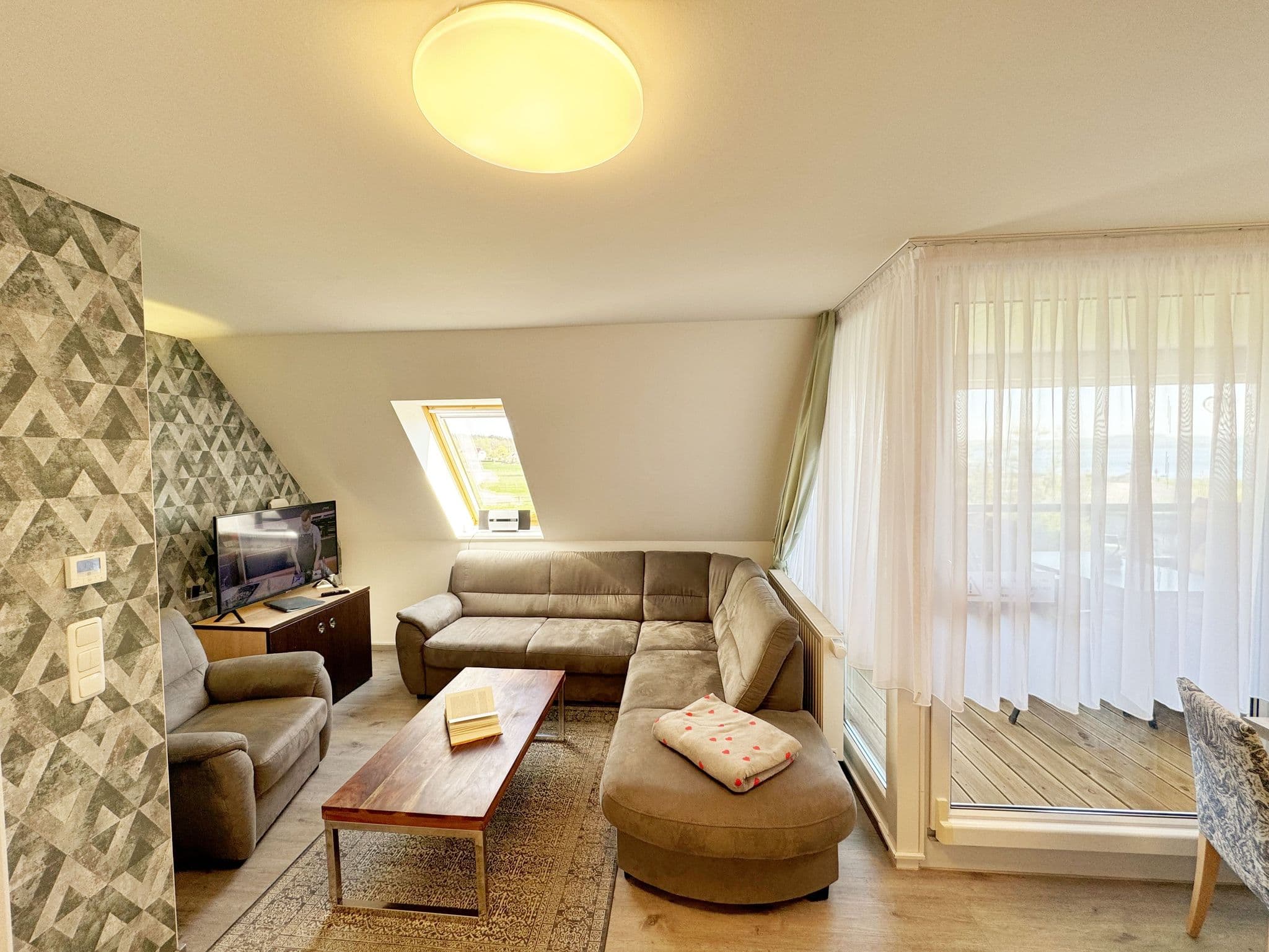 Wohnung 05 mit Balkon und Boddenblick - MR: Haus Inselperle mit Blick auf den Bodden detail 1