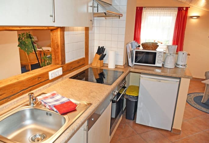 Ferienwohnung mit Balkon und Kamin Bernstein - Ferienwohnungen mit Kamin und Blick zum Selliner Seepark detail 4