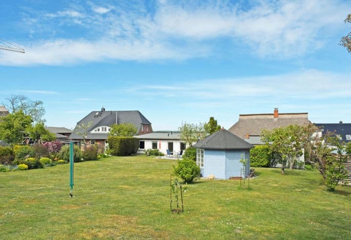 4 - Sterne Ferienhaus Am Brink mit Gartenter. und Meerblick detail 1