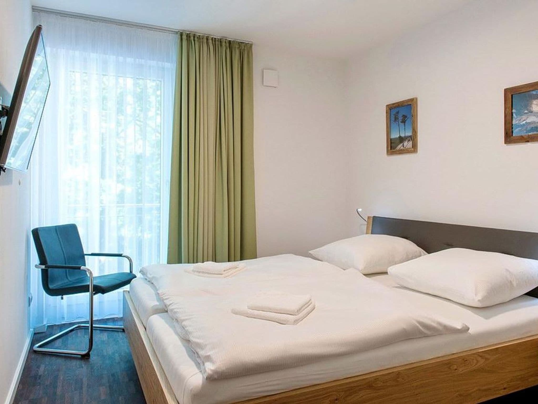 Hochwertiges Familienapartment mit großem Balkon, Whirlbadewanne und Kaminofen - DünenResort Binz detail 3