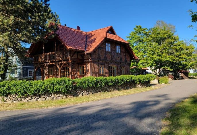 Windhuus – Fachwerk-Charme am Wieker Bodden - Windhuus–Exklusives Fachwerkhaus am Wieker Bodden mit Sauna und Leuchtturm-Blick detail 3