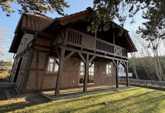 Windhuus – Fachwerk-Charme am Wieker Bodden - Windhuus–Exklusives Fachwerkhaus am Wieker Bodden mit Sauna und Leuchtturm-Blick detail 1