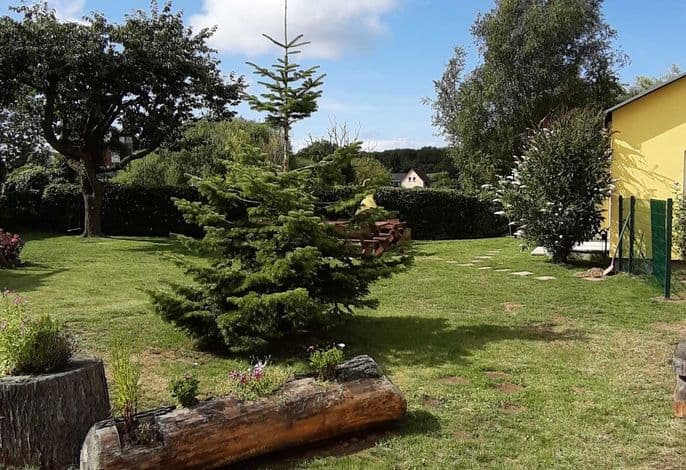 Ferienwohnung Smillenzweg mit eingezäunten Garten detail 4