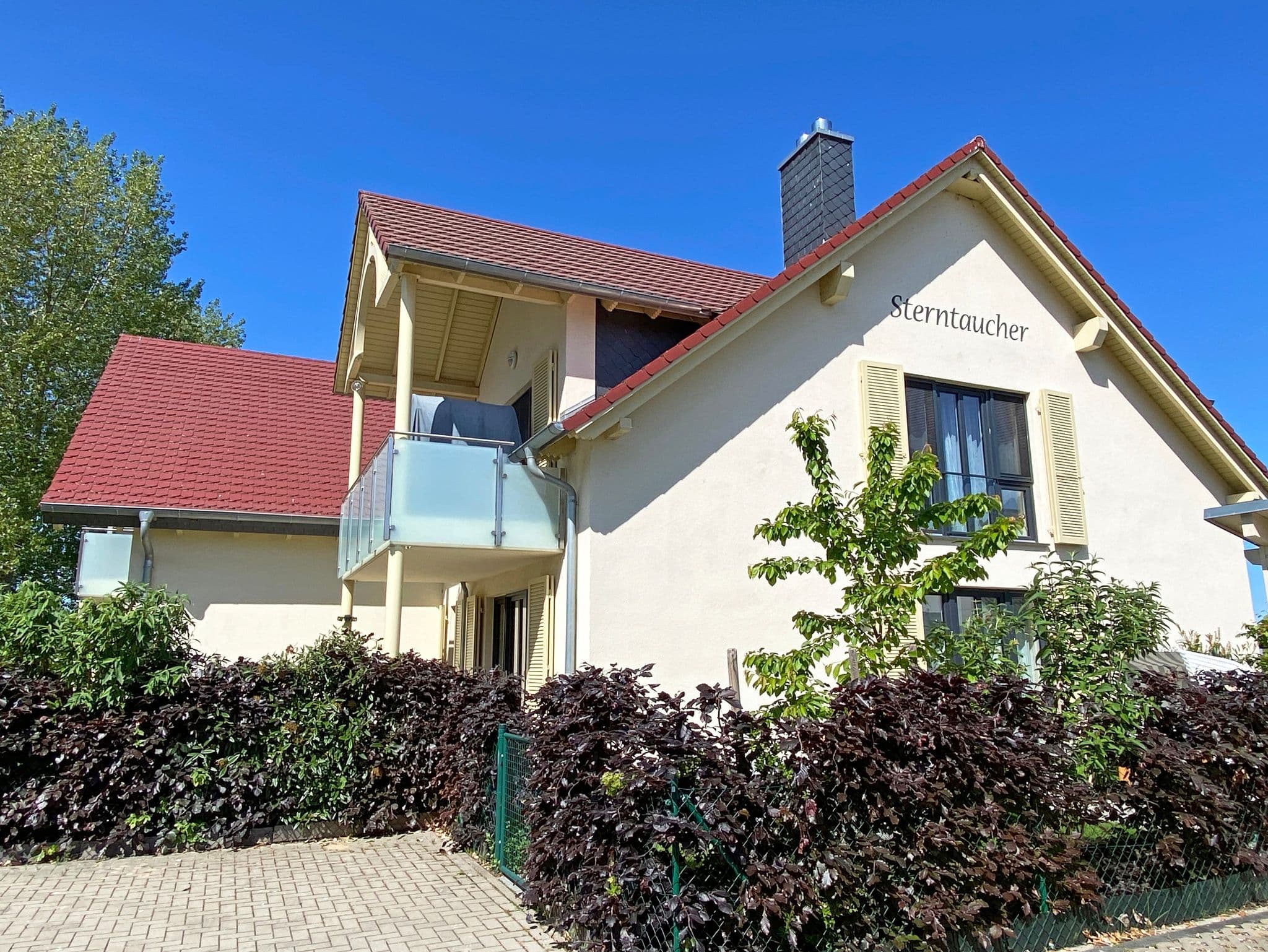 F: Haus Sterntaucher Whg 02 mit Kamin & Terrasse detail 2