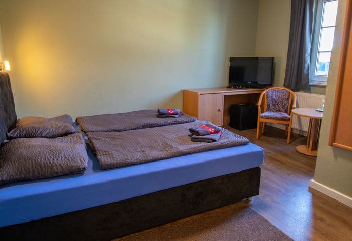 1 - Doppelzimmer - Pension Zur Wittower Fähre detail 2