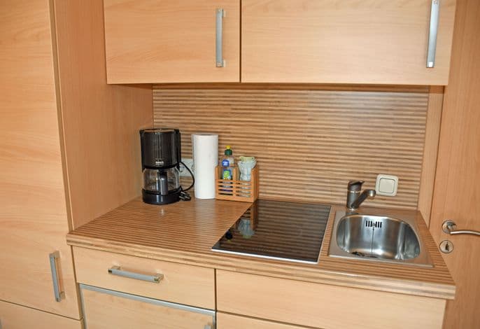 Ferienwohnung petit mit Sonnenterrasse - ruhig gelegene Ferienwohnungen mit Sonnenterrassen detail 3
