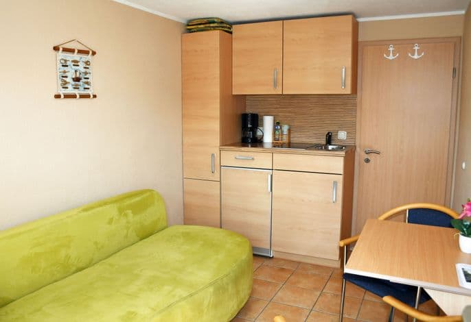 Ferienwohnung petit mit Sonnenterrasse - ruhig gelegene Ferienwohnungen mit Sonnenterrassen detail 1