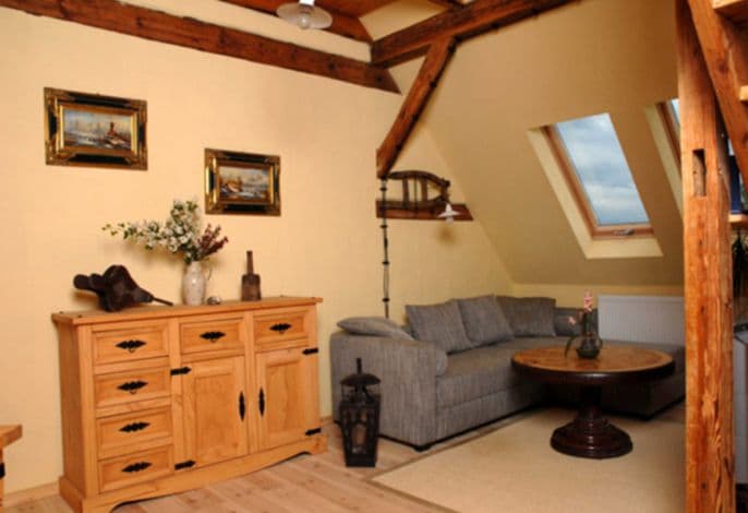 Ferienwohnung Puddemin mit Gartenterrasse - Ferienwohnungen im Süden von Rügen mit Sauna detail 1