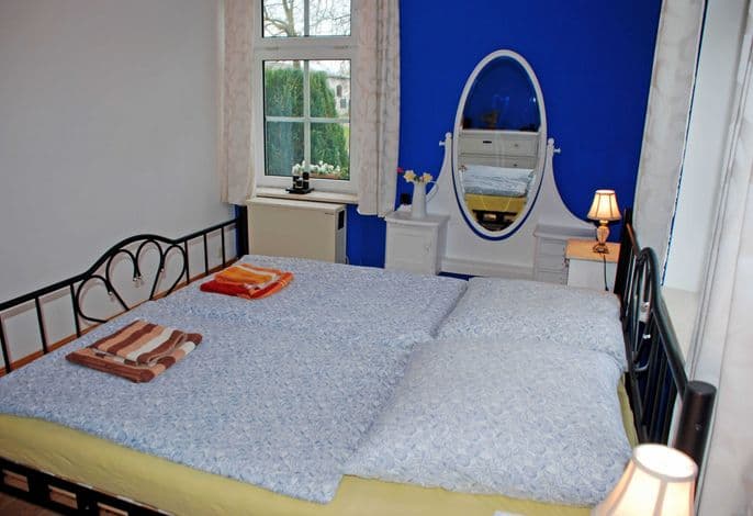 03 Ferienwohnung Rügen mit Kamin - Ferienwohnungen im Gutshaus Gnies detail 2