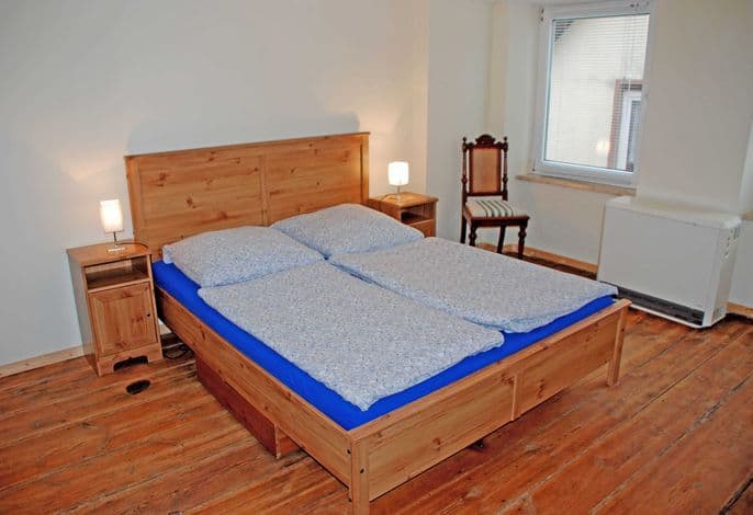 05 Ferienwohnung Ralswiek mit Kamin - Ferienwohnungen im Gutshaus Gnies detail 1
