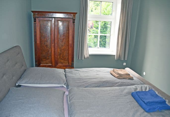 07 Ferienwohnung Muttland mit Kamin - Ferienwohnungen im Gutshaus Gnies detail 4