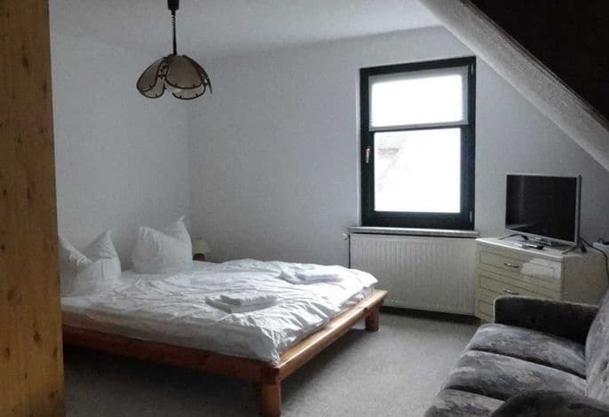 Doppelzimmer 25 m² (Gemeinschaftsbad)