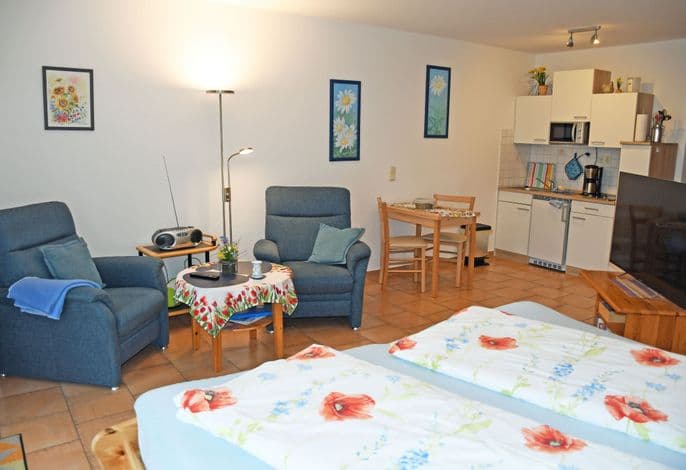Ferienwohnung Oie mit Sonnenterrasse - Ferienwohnungen an der Hagenschen Wiek auf Rügen detail 1