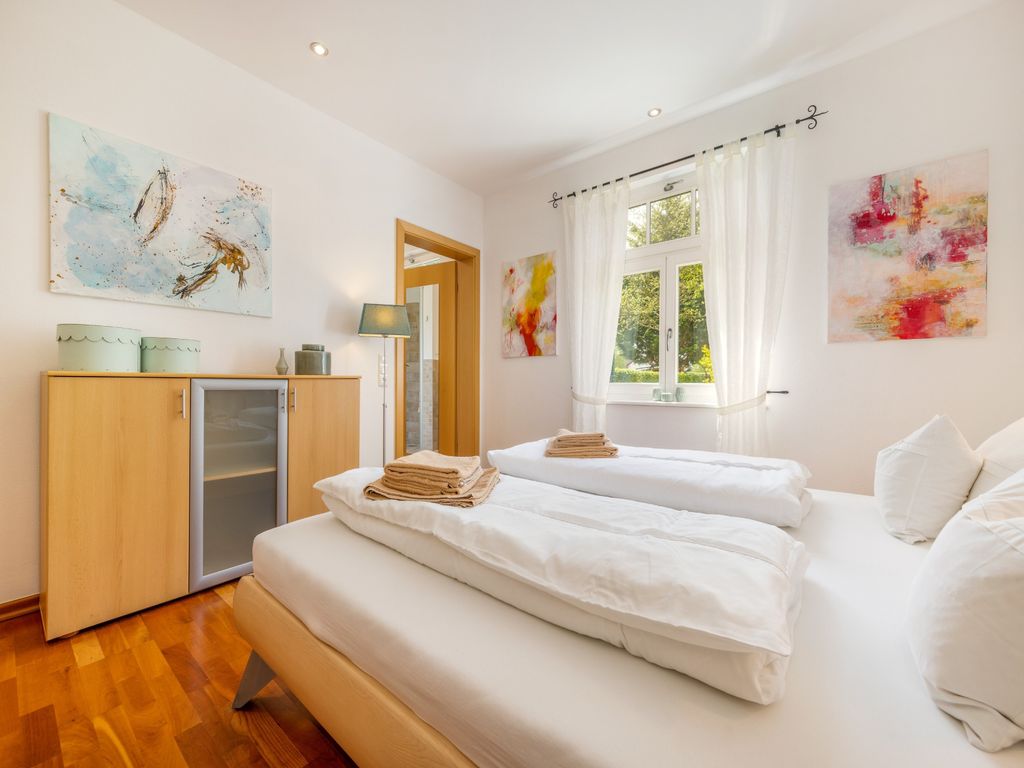 Ferienwohnung - Rügenbrise am Wasser mit Steg und Paddelboot - alles inklusive detail 1