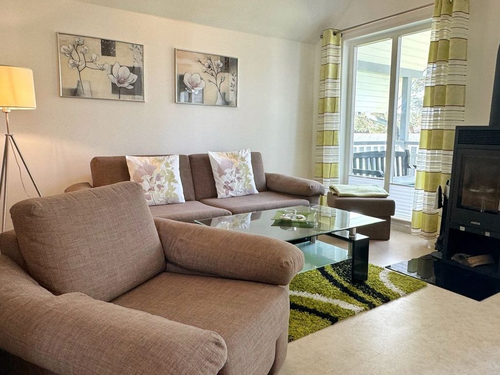 Familienfreundliches Apartment mit Infrarotsauna, Kamin & Balkon in Strandnähe