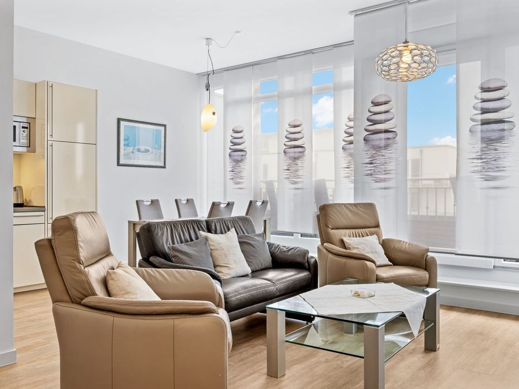 Tolles Penthouse mit Dachterrasse und Meerblick, Strandkorb, Kamin und Sauna!