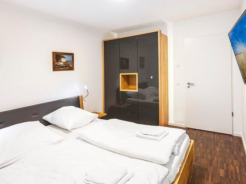 Hochwertiges Familienapartment mit großem Balkon, Whirlbadewanne und Kaminofen - DünenResort Binz detail 4