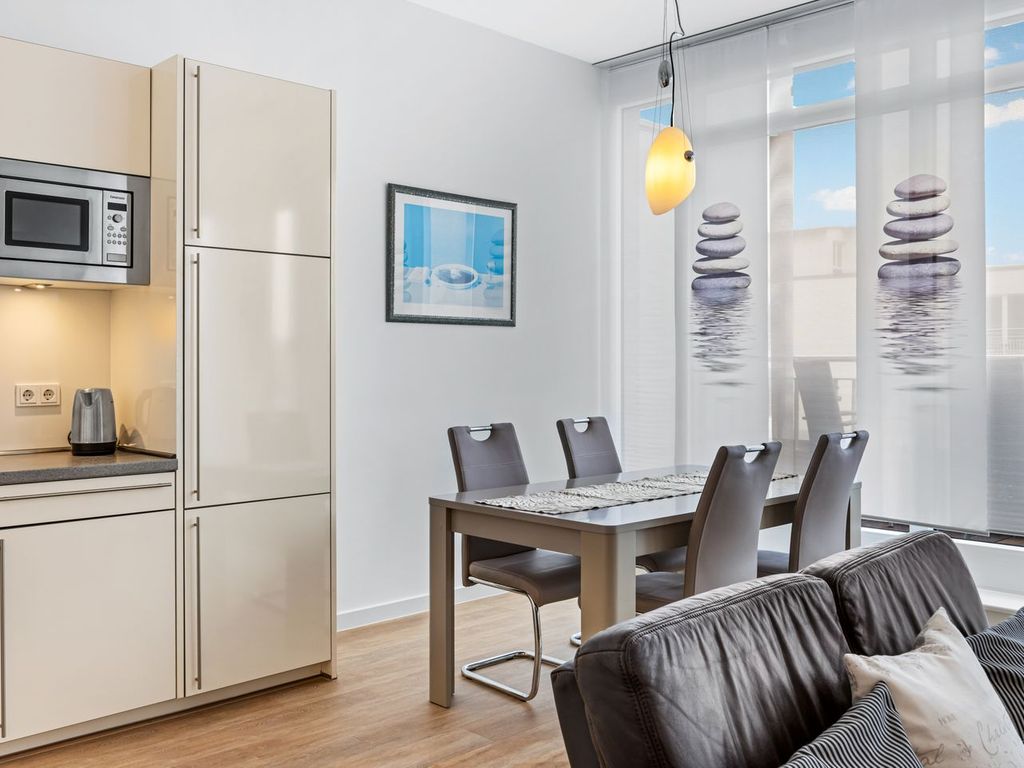 Tolles Penthouse mit Dachterrasse und Meerblick, Strandkorb, Kamin und Sauna! - DünenResort Binz detail 4