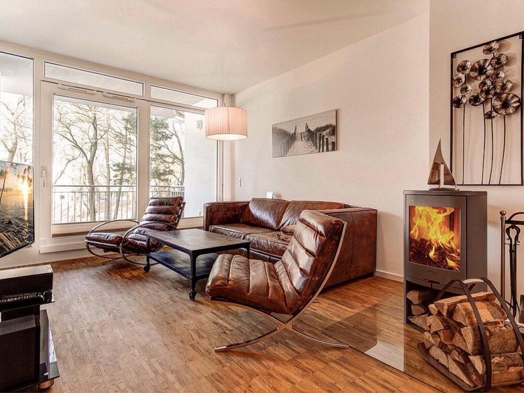 Stilvolles Apartment mit großem Balkon und Kaminofen - nur 150 m zum Strand!