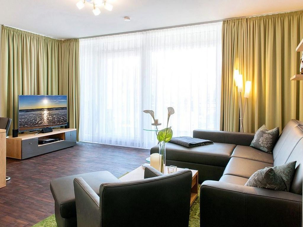 Hochwertiges Familienapartment mit großem Balkon, Whirlbadewanne und Kaminofen