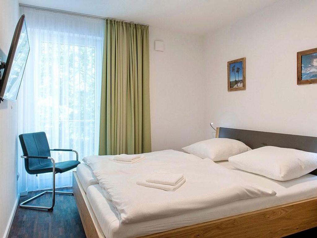 Hochwertiges Familienapartment mit großem Balkon, Whirlbadewanne und Kaminofen - DünenResort Binz detail 3