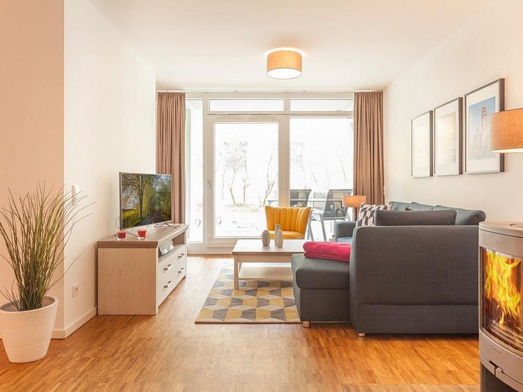 Schönes Apartment mit Südterrasse, Kaminofen & Fußbodenheizung - 150m zum Strand