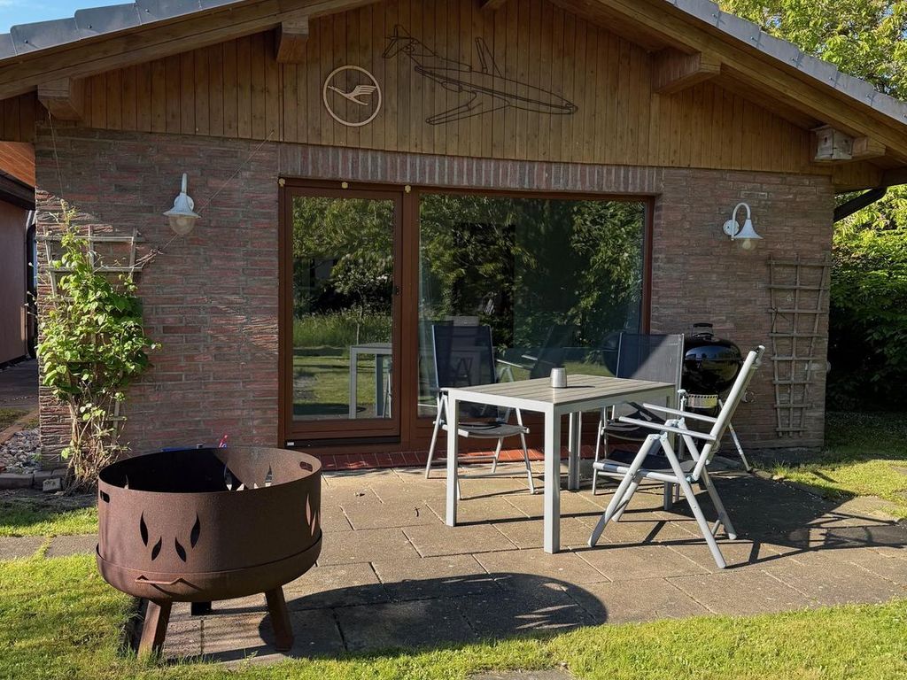 Bungalow im Garten - ruhig im Grünen mit Grill detail 1