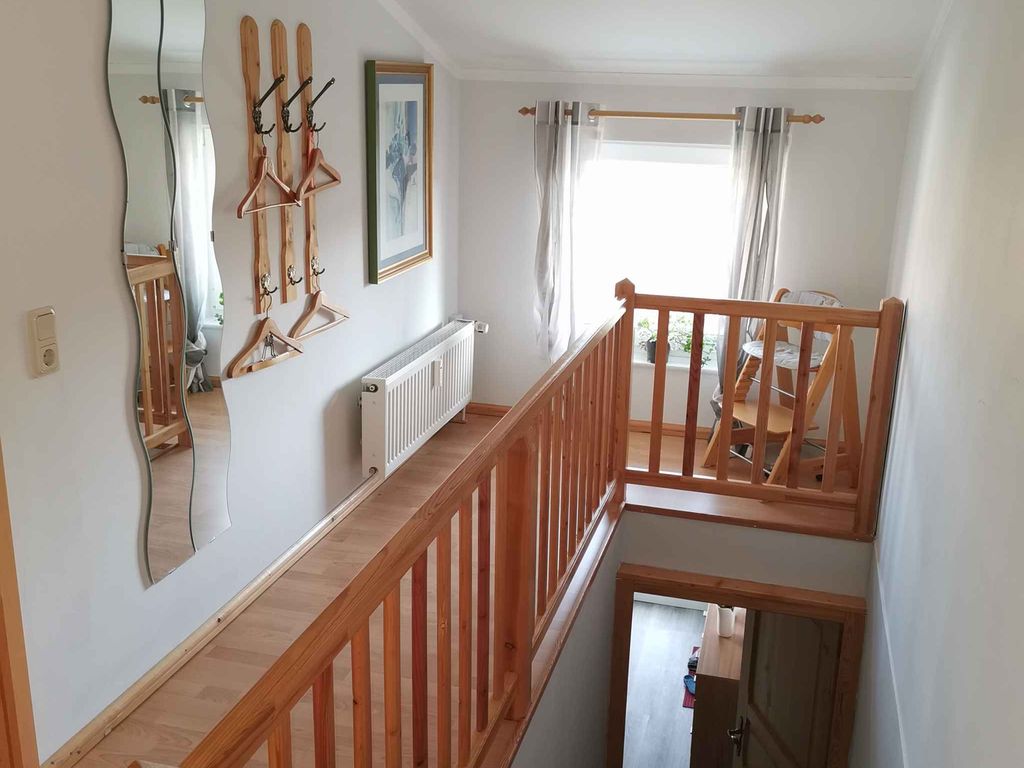 Ferienwohnung mit Blick zum kleinen Jasmunder Bodden und Gartensitzplatz detail 4