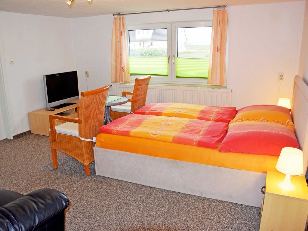 Ferienwohnung unterm Reetdach mit Terrasse Lee