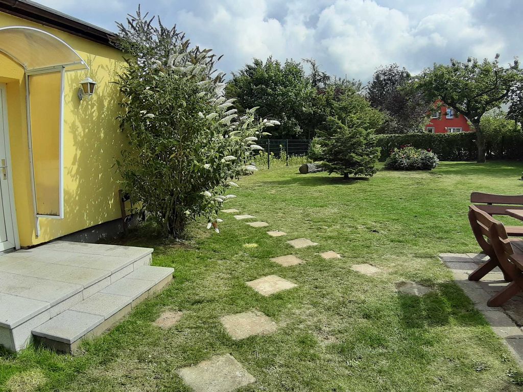 Ferienwohnung Smillenzweg mit eingezäunten Garten detail 1