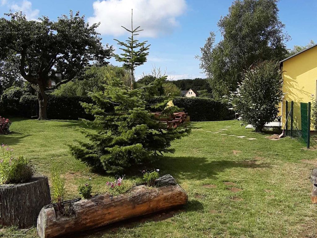 Ferienwohnung Smillenzweg mit eingezäunten Garten detail 4