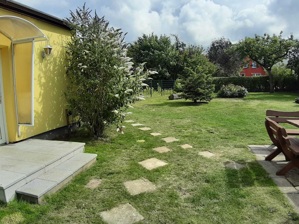 Ferienwohnung Smillenzweg mit eingezäunten Garten detail 3