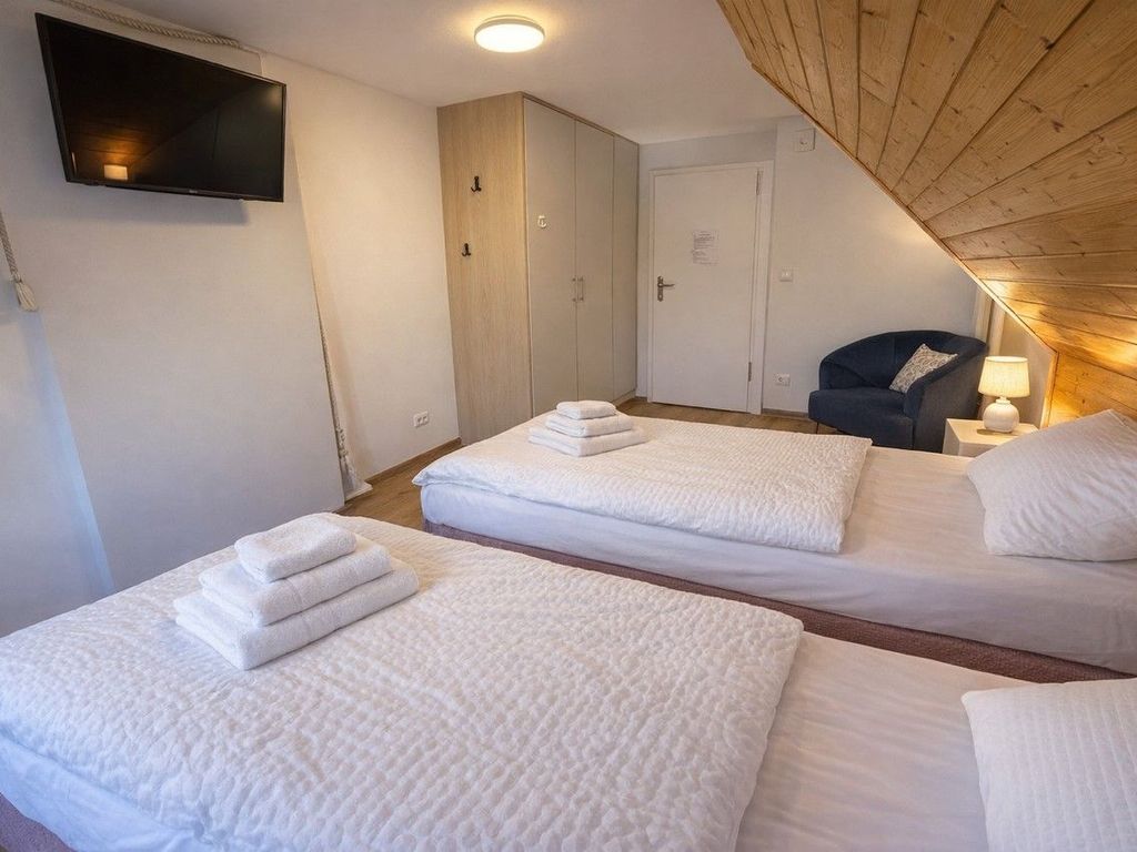 Doppelzimmer 1 mit zwei Einzelbetten - Ferienzimmer Präkel detail 2