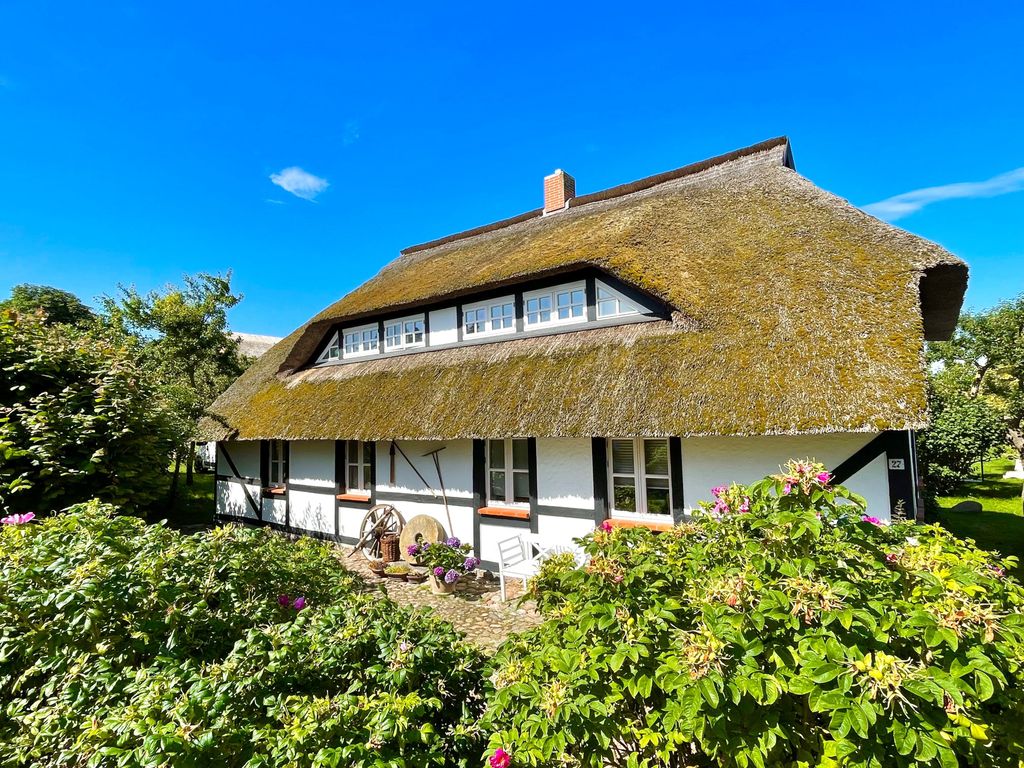 Mönchguter Ferienhaus unterm Reetdach mit Kamin und Sauna