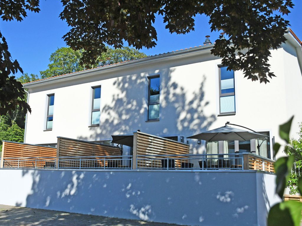 Haus Carl - Ferienwohnungen mit Kamin im Ostseebad Sellin