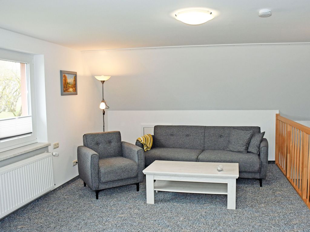 Ferienwohnung Tilda mit Terrasse - Ferienwohnungen Udars auf Rügen detail 1