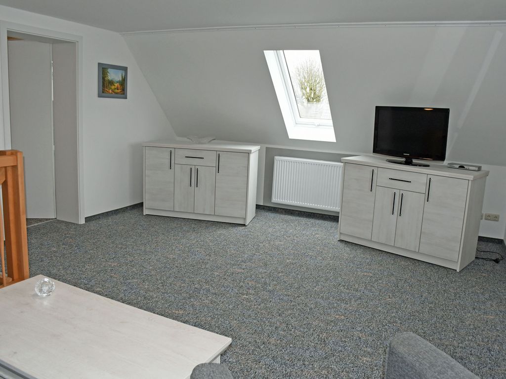 Ferienwohnung Tilda mit Terrasse - Ferienwohnungen Udars auf Rügen detail 2