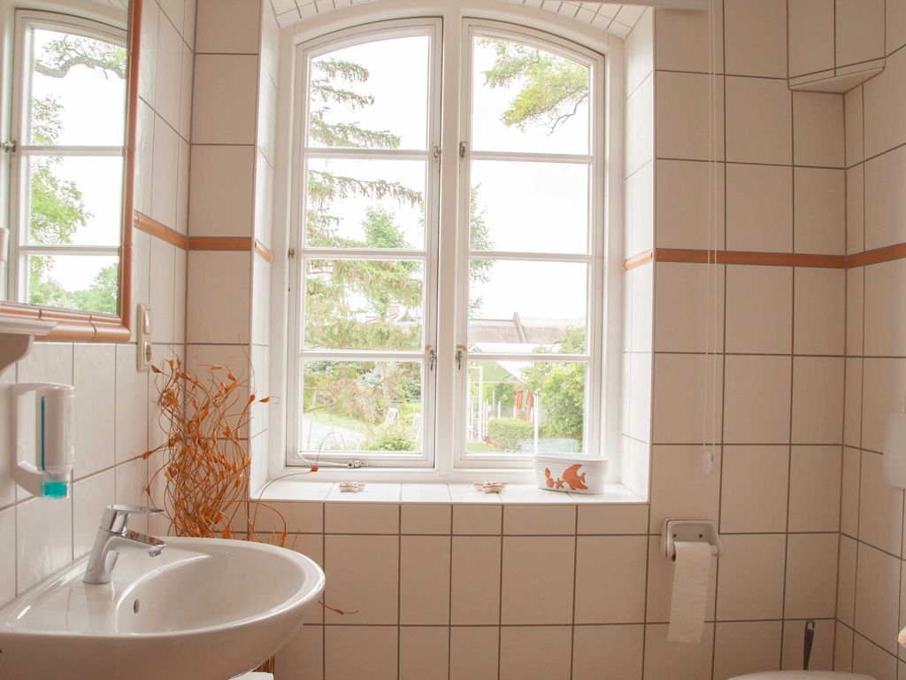 Nr. 4 Appartement mit Kamin - Ferienwohnungen im Landhaus am Deich mit großem Garten detail 4
