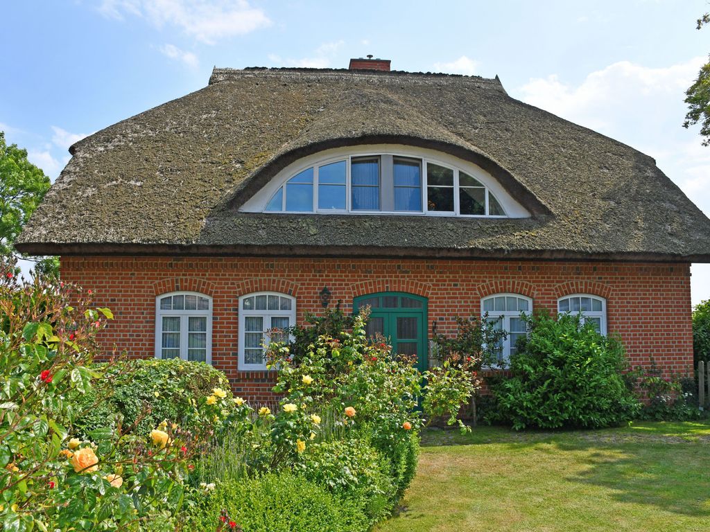 Ferienwohnungen im Landhaus am Deich mit großem Garten detail 4