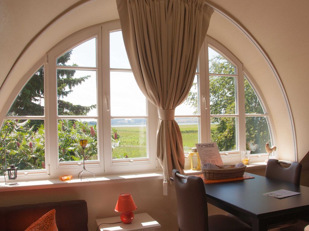 Nr. 3 Appartement mit Kamin - Ferienwohnungen im Landhaus am Deich mit großem Garten detail 4