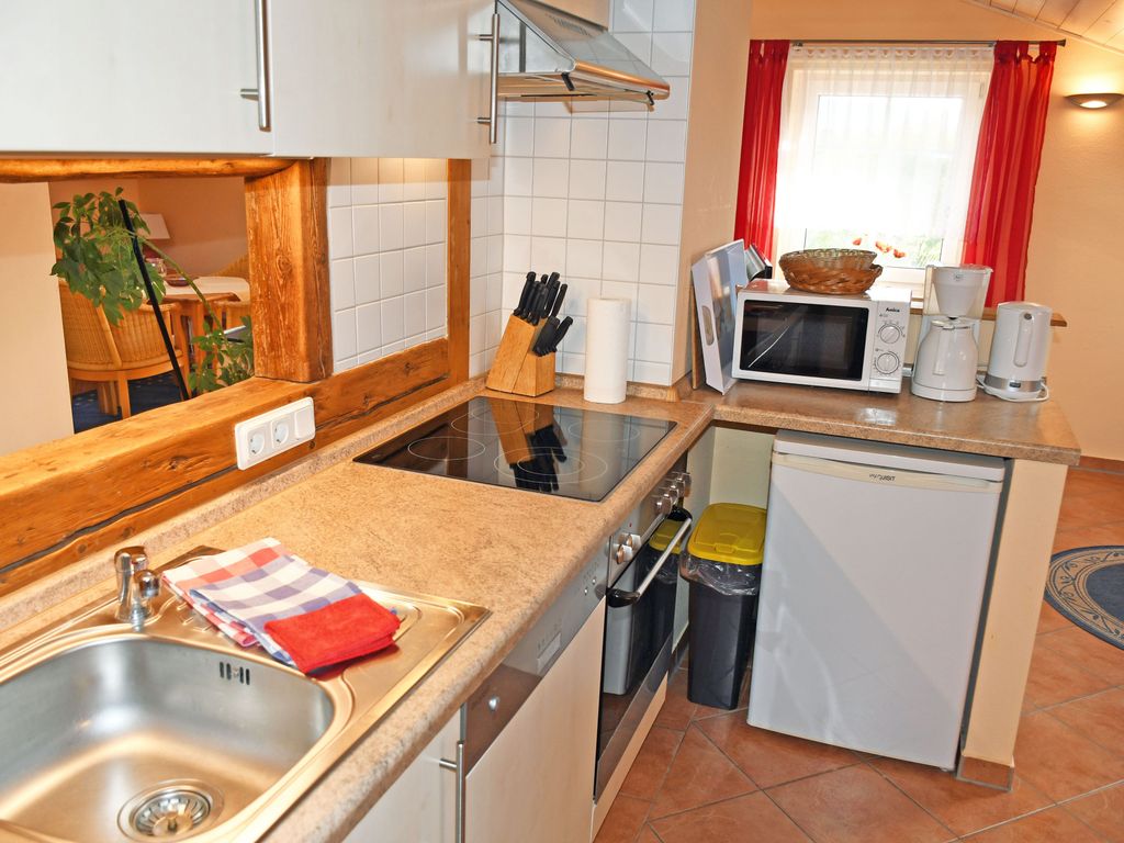 Ferienwohnung mit Balkon und Kamin Bernstein - Ferienwohnungen mit Kamin und Blick zum Selliner Seepark detail 4
