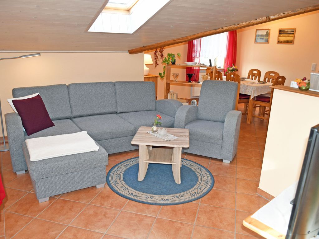 Ferienwohnung mit Balkon und Kamin Bernstein - Ferienwohnungen mit Kamin und Blick zum Selliner Seepark detail 1