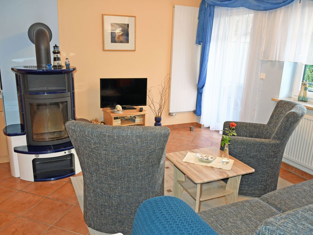 Ferienwohnung mit Balkon und Kamin Hühnergott - Ferienwohnungen mit Kamin und Blick zum Selliner Seepark detail 1