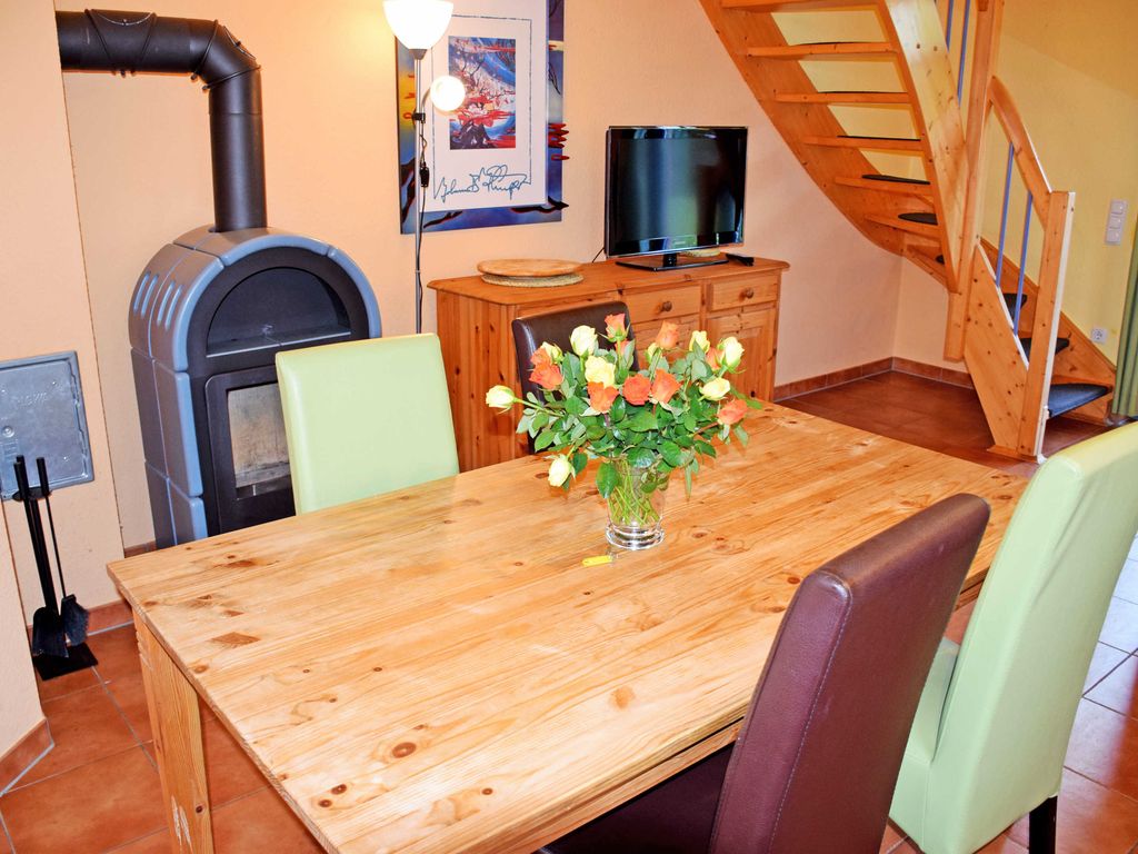 Appartement 5 mit Kamin und Terrasse Nixenhus - Ferienappartements zum Ostseestrand mit Terrasse detail 1