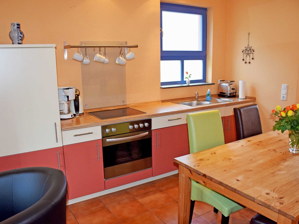 Appartement 5 mit Kamin und Terrasse Nixenhus - Ferienappartements zum Ostseestrand mit Terrasse detail 4