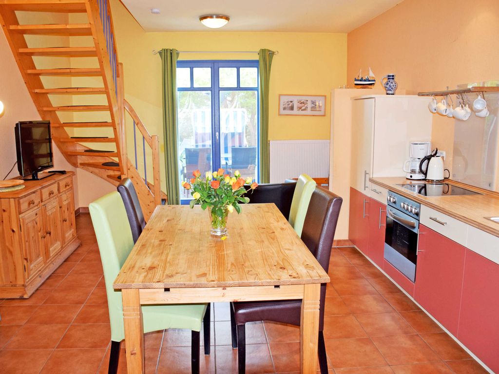 Appartement 5 mit Kamin und Terrasse Nixenhus - Ferienappartements zum Ostseestrand mit Terrasse detail 2