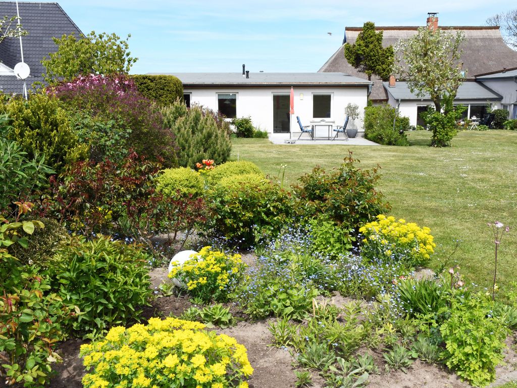 4 - Sterne Ferienhaus Am Brink mit Gartenter. und Meerblick detail 3