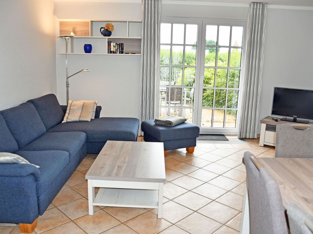 Ferienwohnung EG 2 mit Terrasse und Strandkorb - Landhaus mit Reetdach am Teich detail 3
